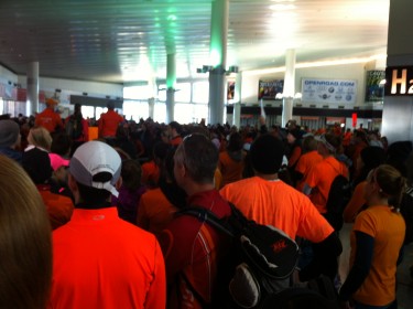 The Orange-Clad Army Waiting for the Staten Island Ferry